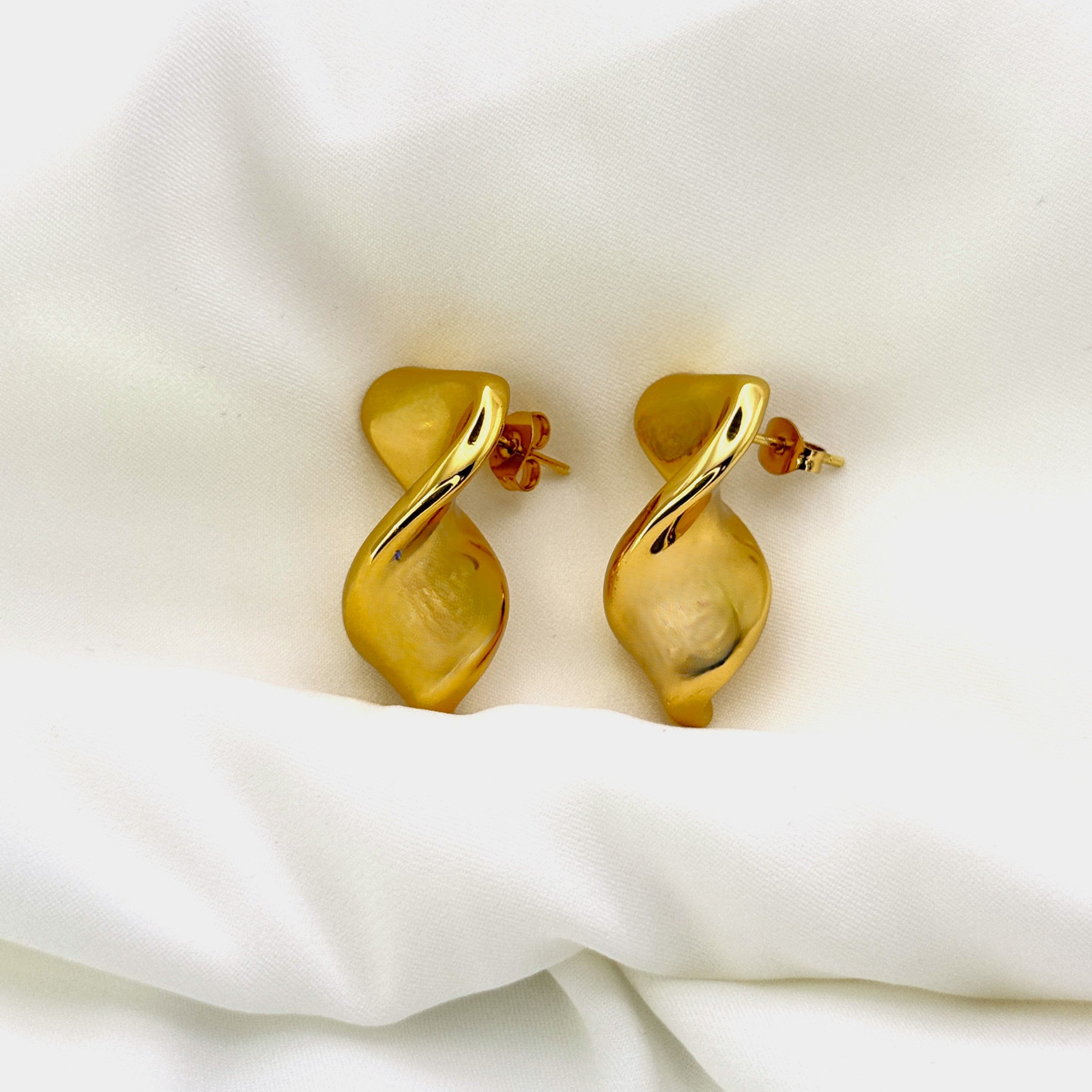 Σκουλαρίκια Ατσάλινα Στριφτό Σχέδιο