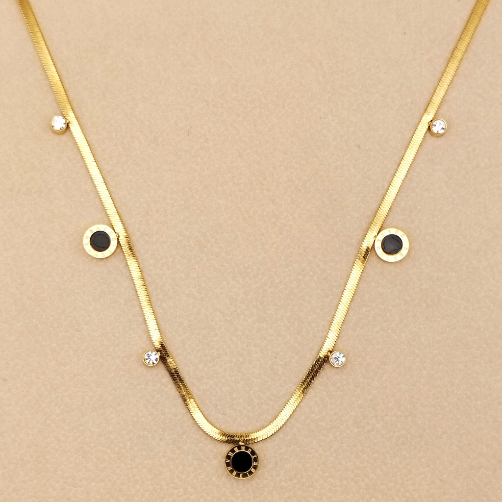 Πλακέ κολιέ με στρογγυλά στοιχεία